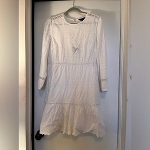 White eyelet dress. Super cute with puff sleeve and fitted waist.